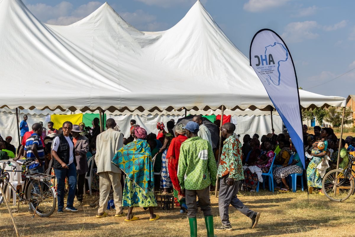 A facilitator leading a community health session
