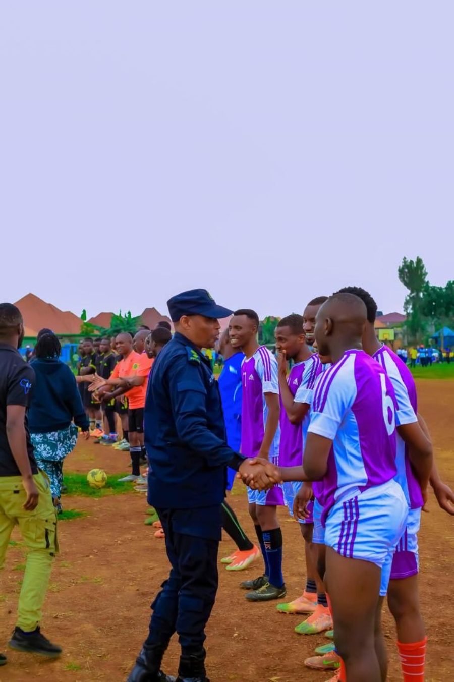 District leadership greeting players before a friendly match in Rusizi